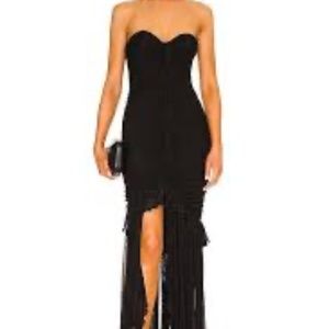 Long Black Giules Gown by MAJORELLE side slit and ruffles